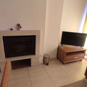 The chimney in the living room.